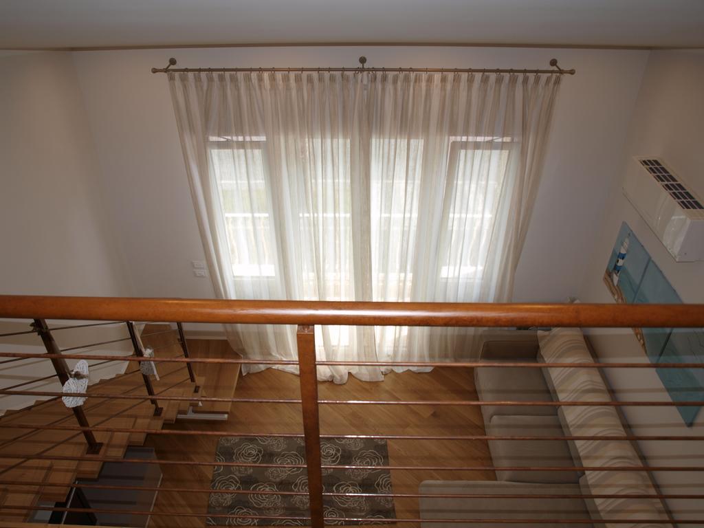 Il Pontile Holidays Apartment Марина-ді-П'єтразанта Номер фото