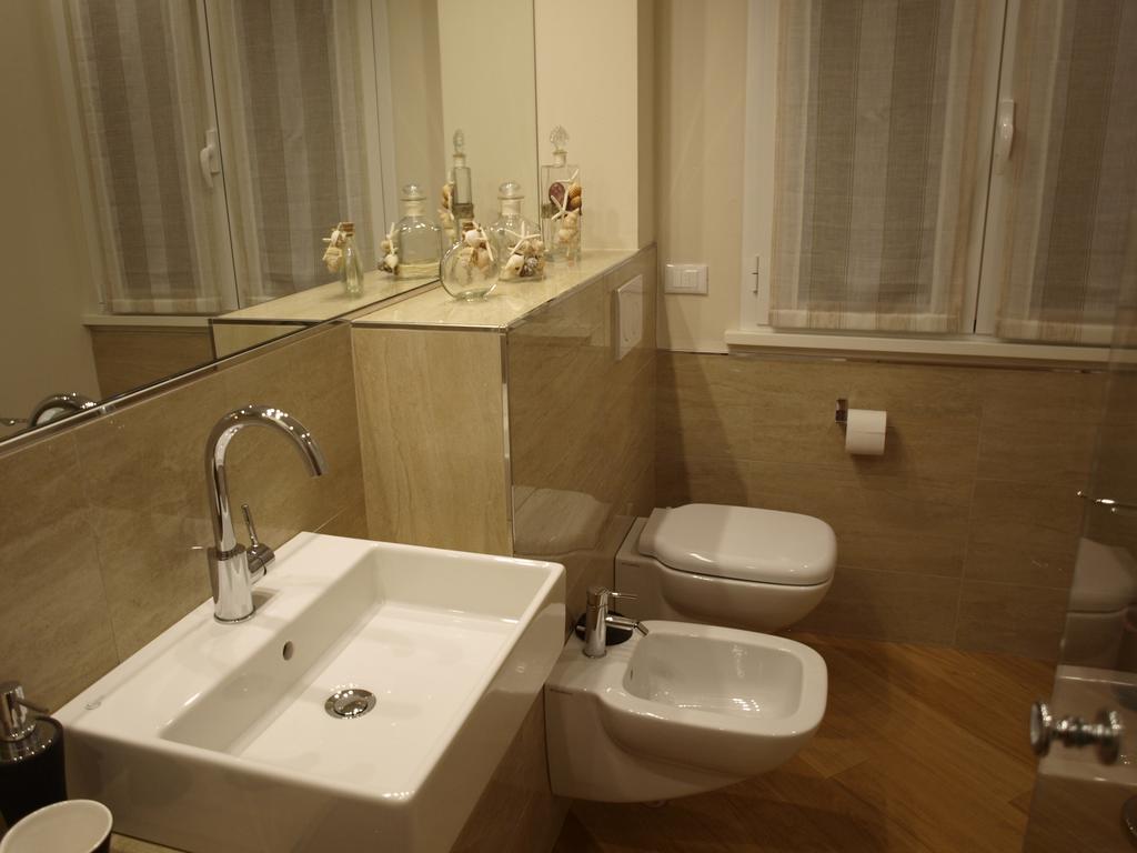 Il Pontile Holidays Apartment Марина-ді-П'єтразанта Номер фото